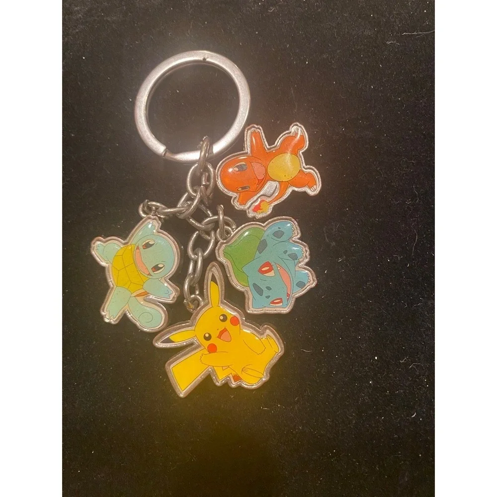 Pokémon Key Chain. Charms Of Pikachu , Charmander, Squirtle , Bulbasaur
